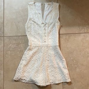 White romper with lace detailing